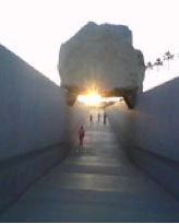 21’ tall granite quarry fragment in a permanent installation at the Los Angeles County Museum of Art. This is an April 20th sunset with near perfect sun- to- stone alignment. Image courtesy of Stephen Knudsen.